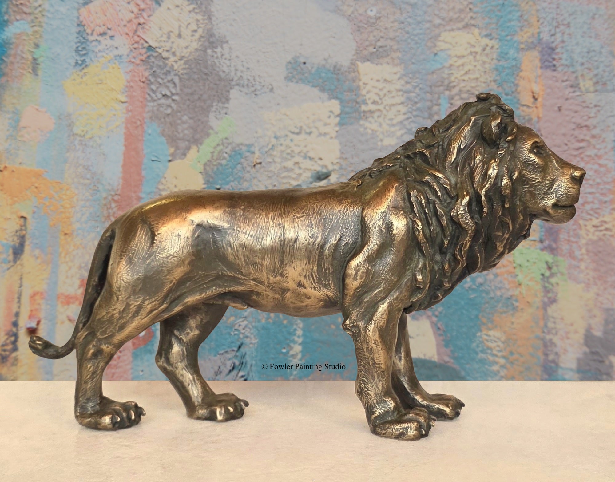 A bronze sculpture of a Desert Lion, by artist Jon Fowler. © Fowler Painting Studio.