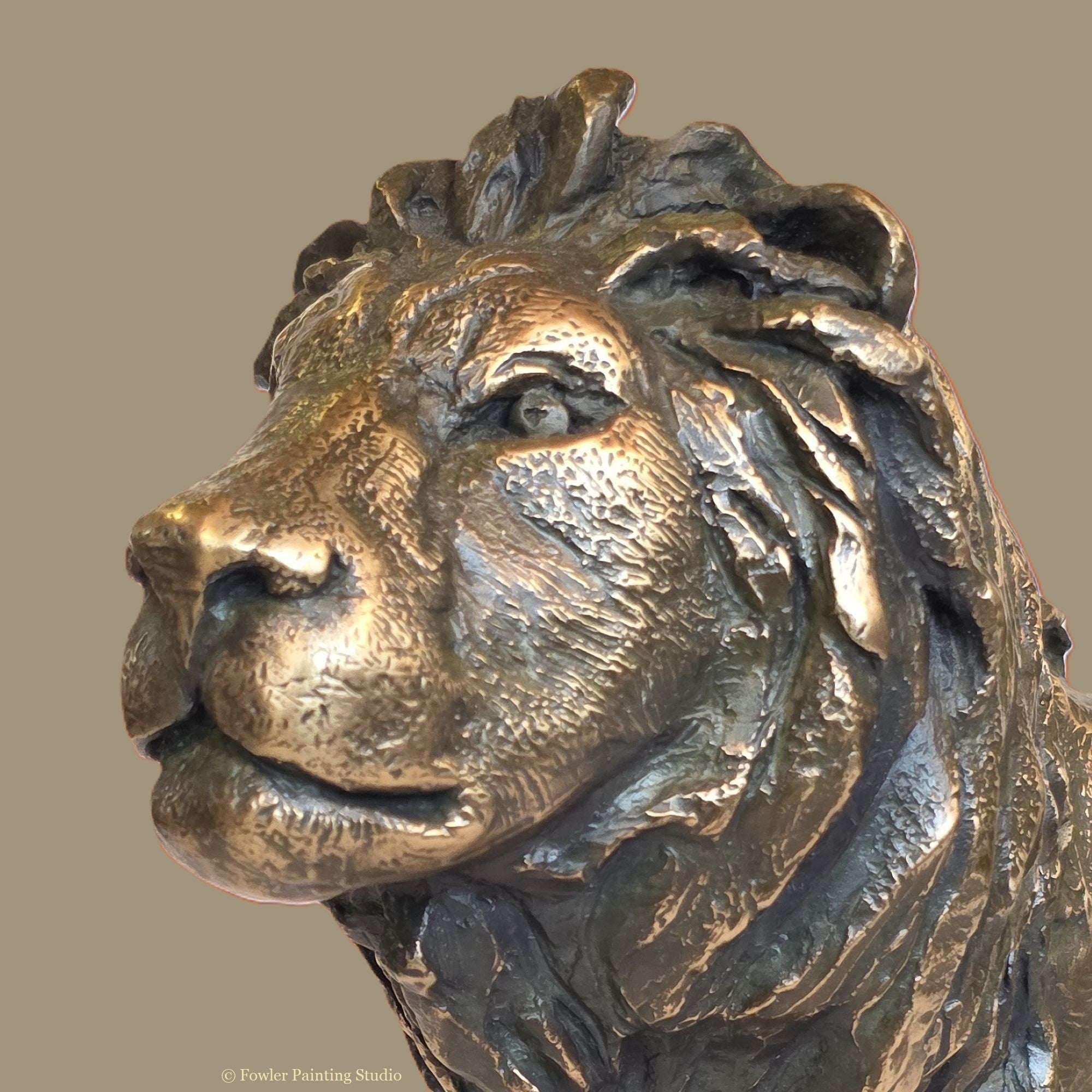 "Sunbaked - the Desert Lion" a bronze sculpture by artist, Jon Fowler.