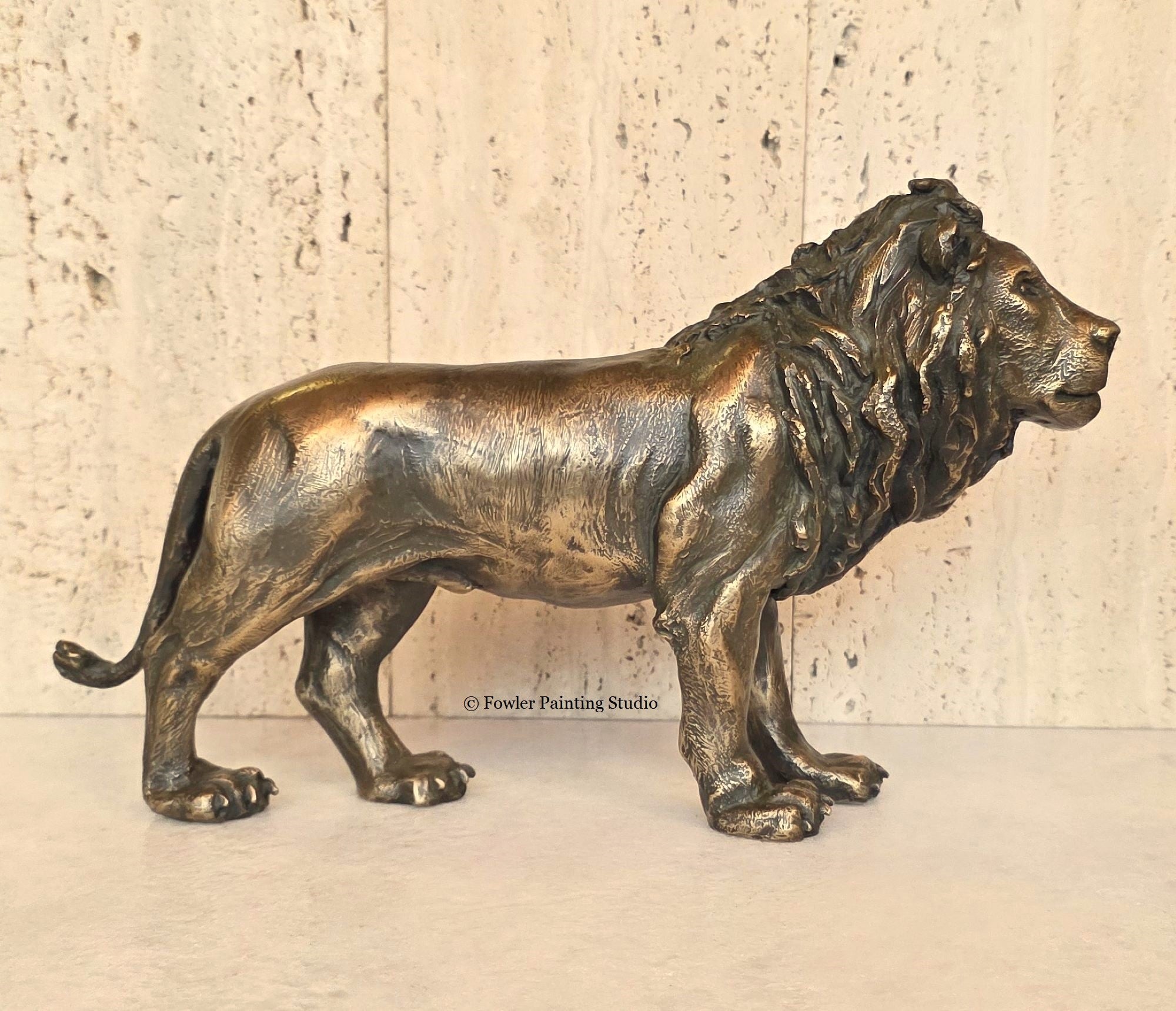 "Sunbaked - the Desert Lion" a bronze sculpture by artist, Jon Fowler.